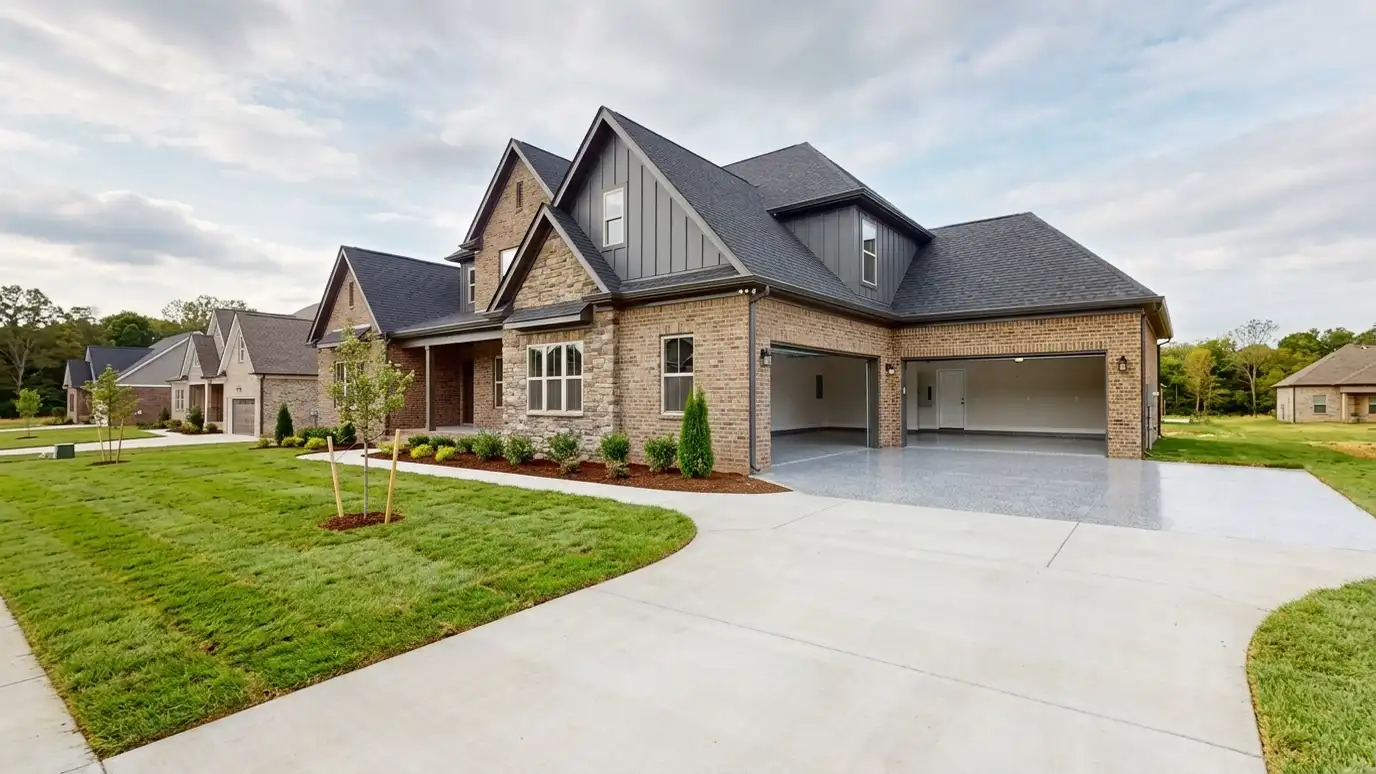 A Mt. Juliet, Tennessee home with the garage door open showing a glossy coated flake floor inside